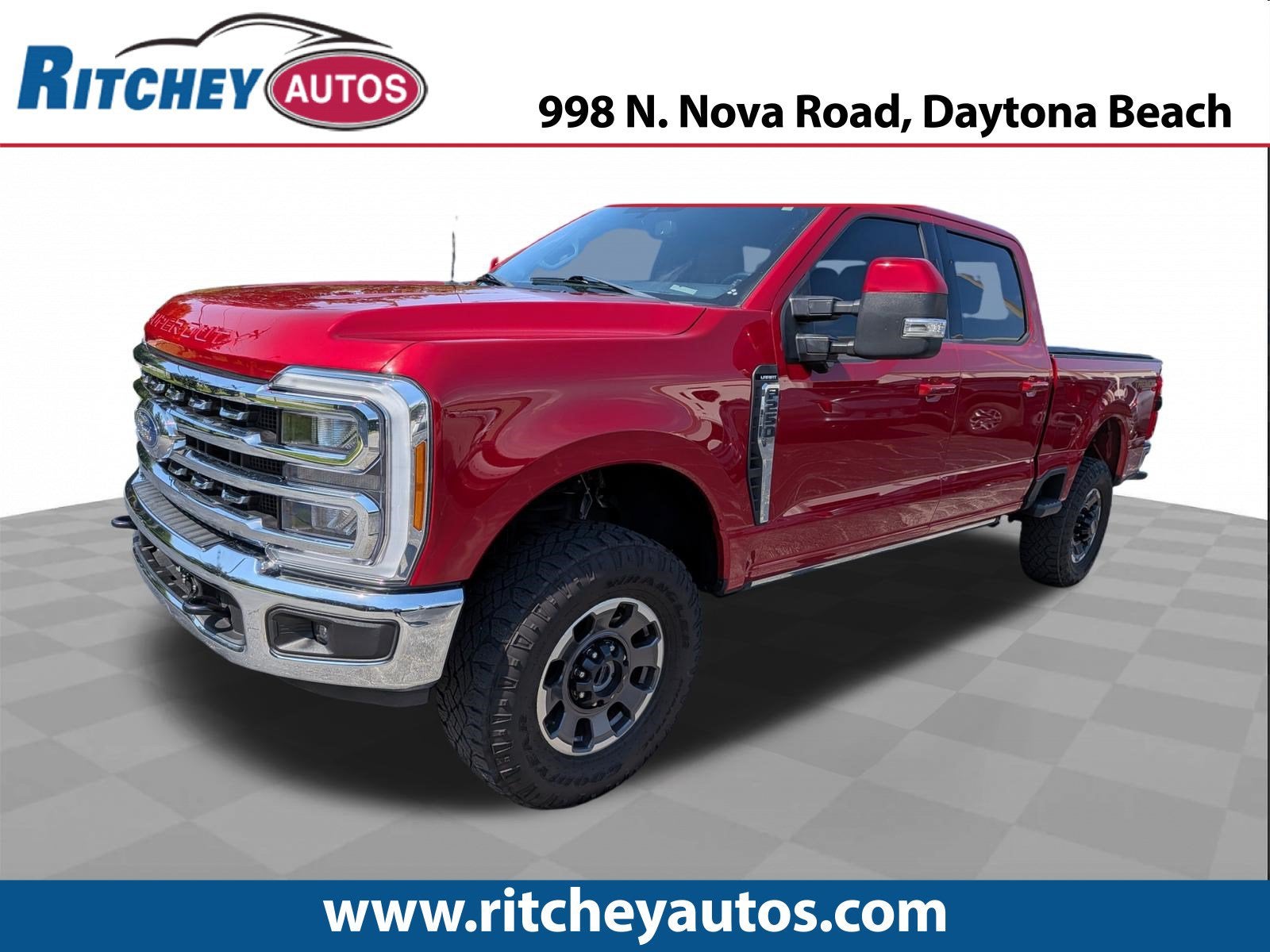 2023 Ford F-250 LARIAT in Red — front three-quarter view