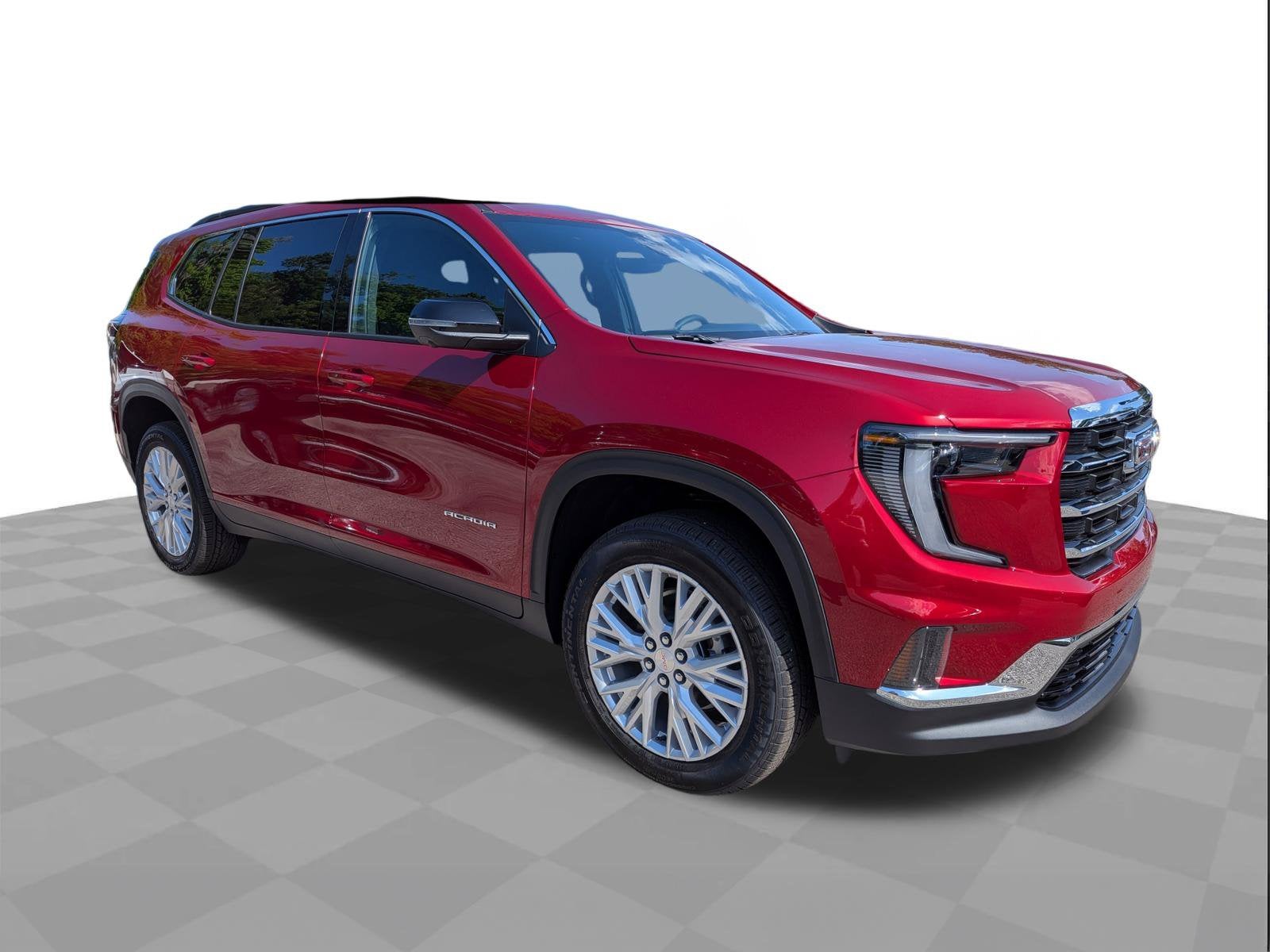 2026 GMC Acadia Elevation in Volcanic Red Tintcoat — front three-quarter view