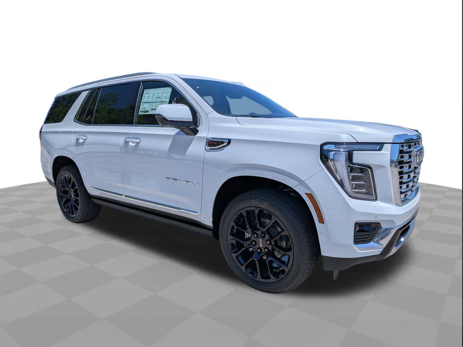 2026 GMC Yukon Denali in Glacier White Tricoat — front three-quarter view