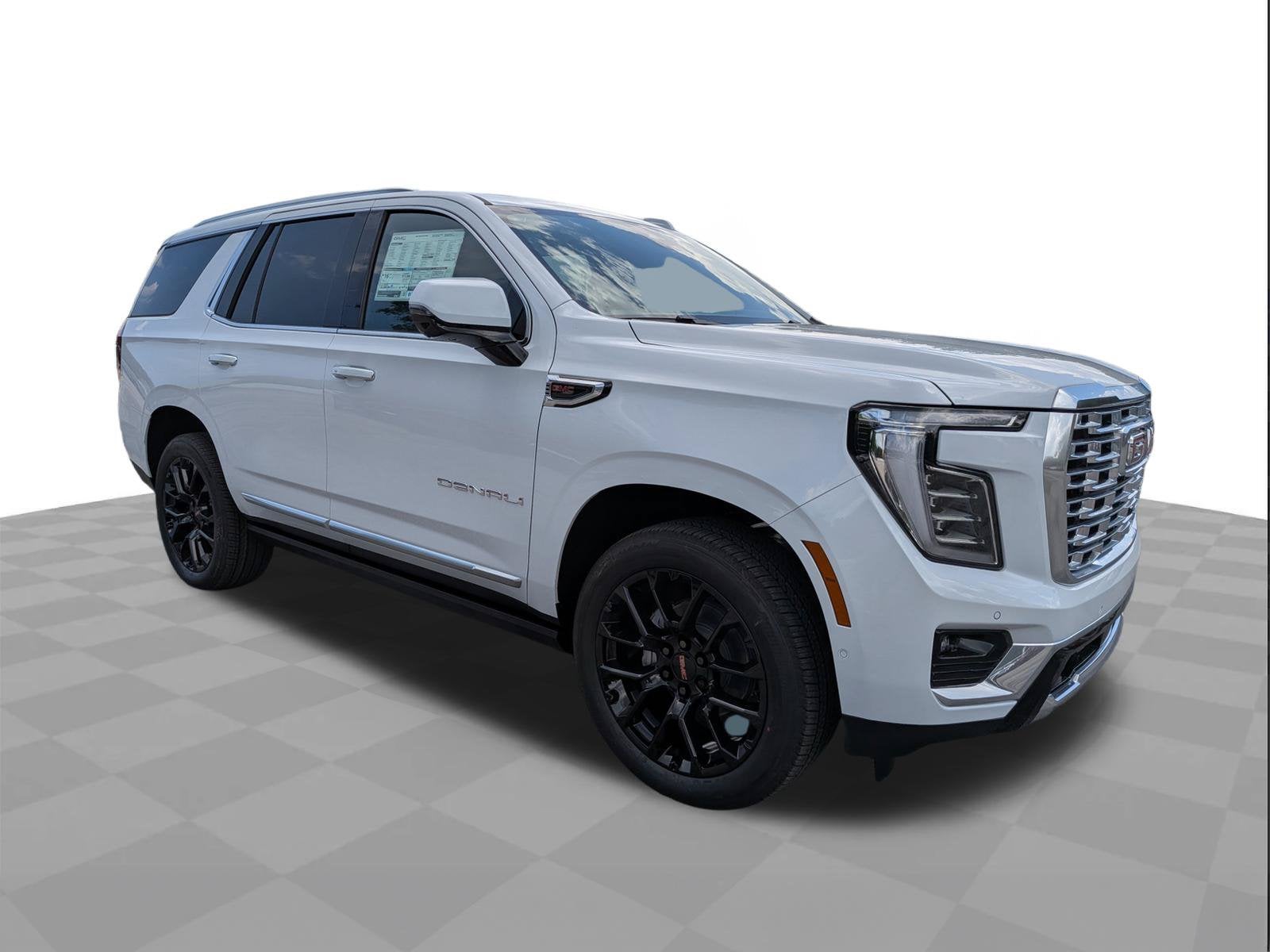2026 GMC Yukon Denali in Glacier White Tricoat — front three-quarter view