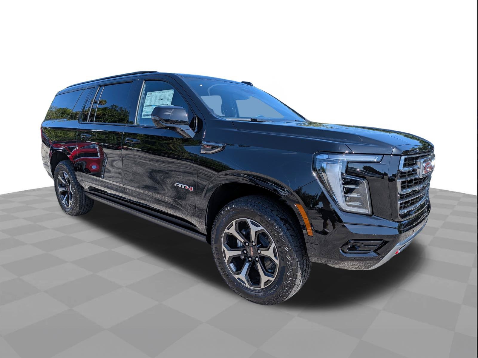 2026 GMC Yukon XL AT4 in Onyx Black — front three-quarter view