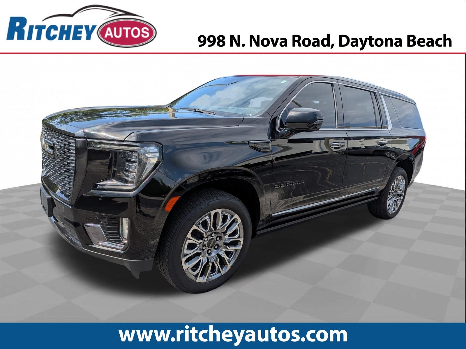 2023 GMC Yukon XL Denali Ultimate in Onyx Black — front three-quarter view