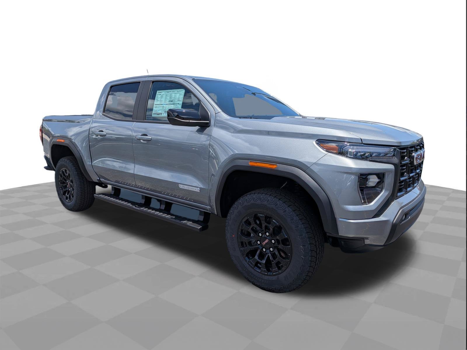 2026 GMC Canyon Elevation in Sterling Metallic — front three-quarter view