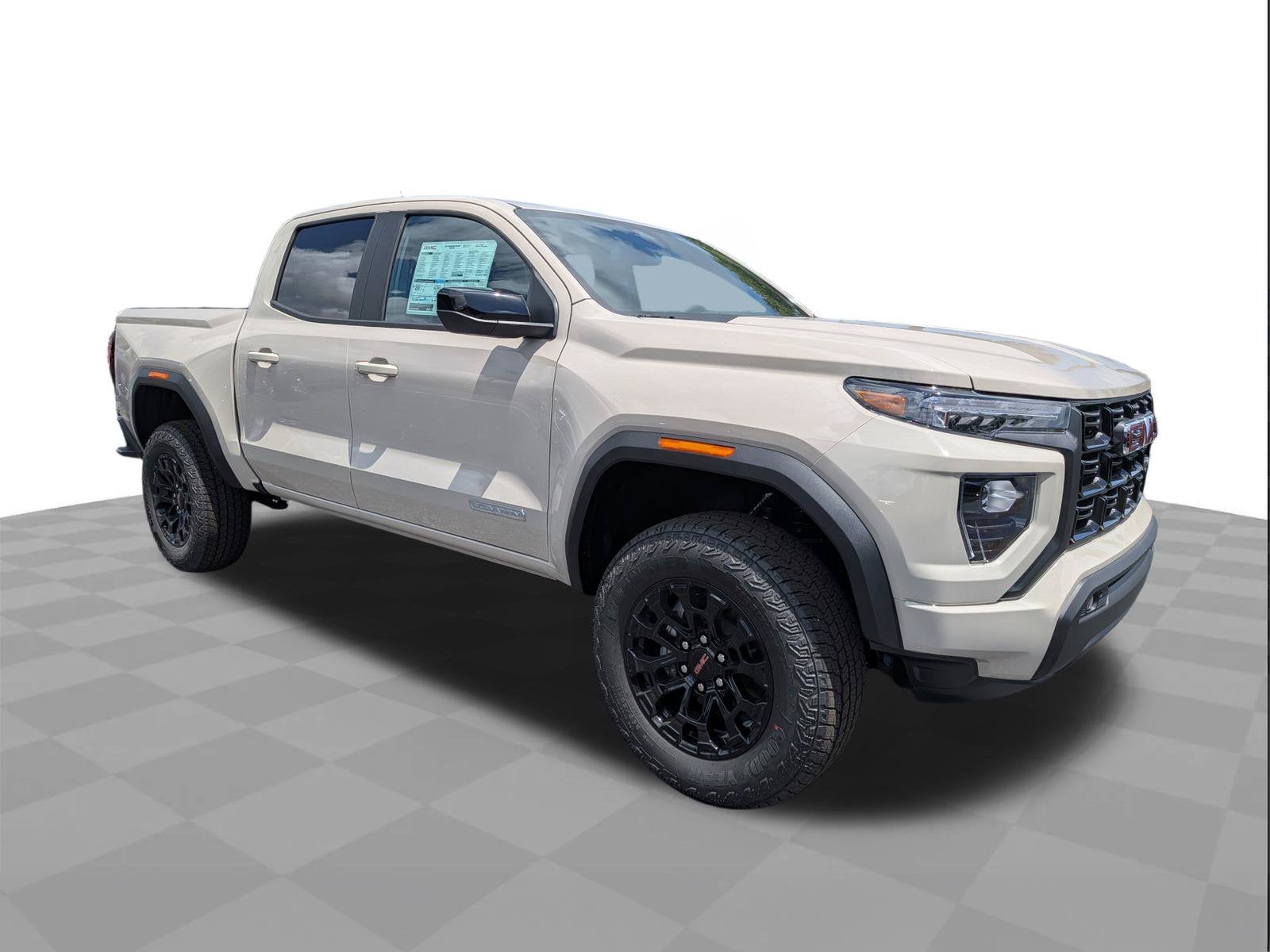 2026 GMC Canyon Elevation in Coastal Dune — front three-quarter view