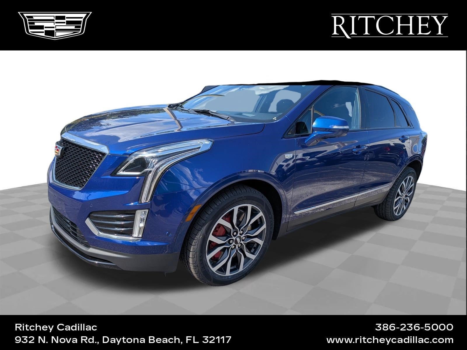 2024 Cadillac XT5 Sport in Opulent Blue Metallic — front three-quarter view