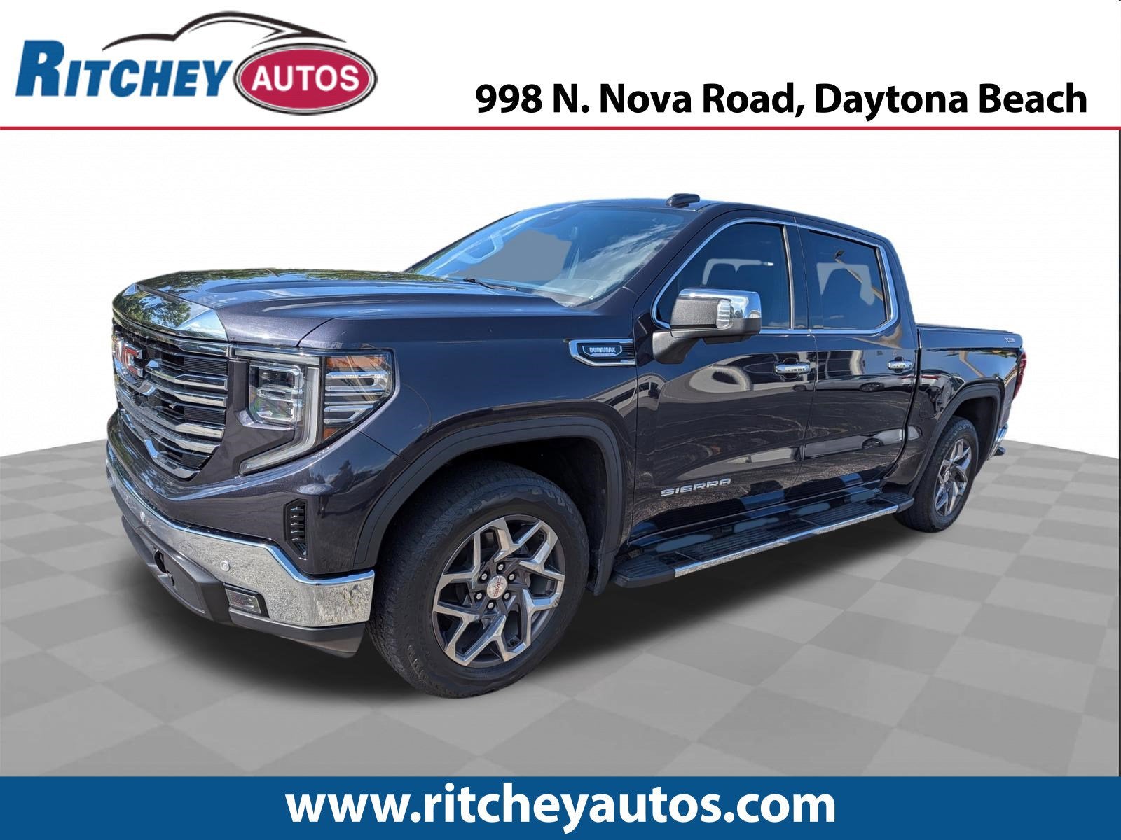 2023 GMC Sierra 1500 SLT in Titanium Rush Metallic — front three-quarter view