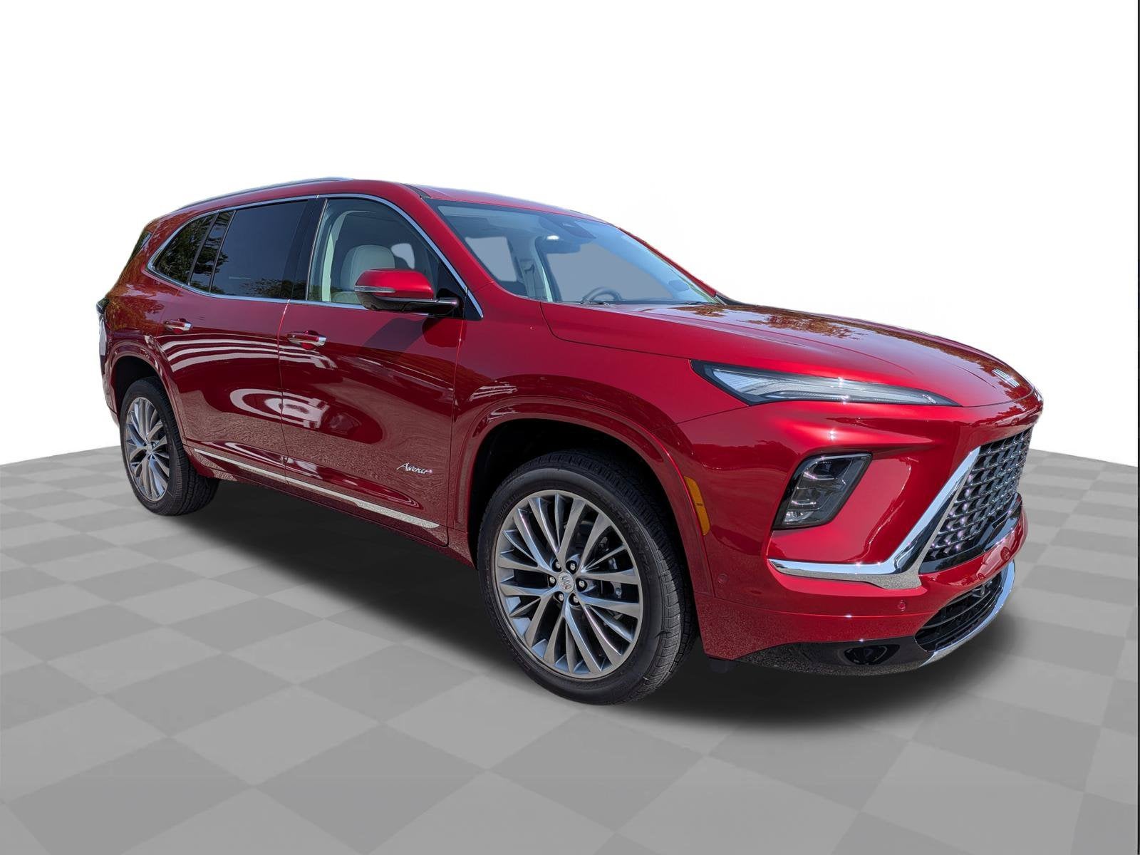 2026 Buick Enclave Avenir in Cherry Red Tintcoat — front three-quarter view