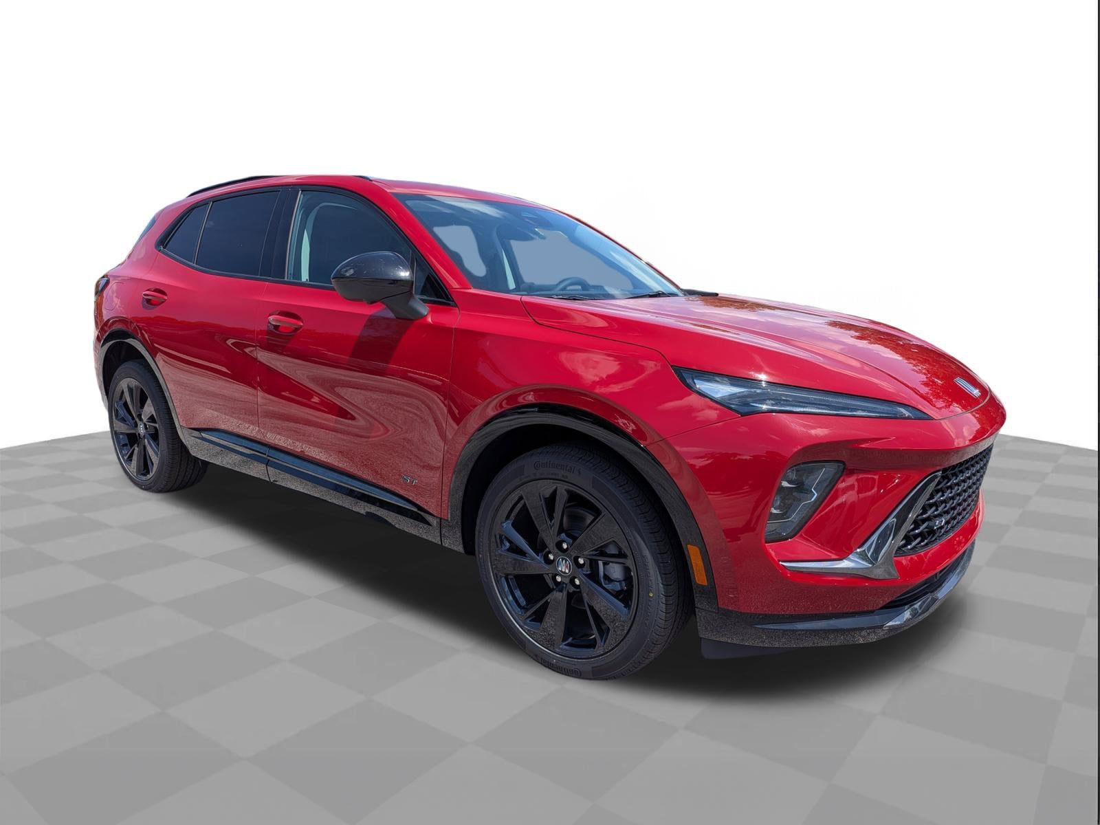 2026 Buick Envision Sport Touring in Brilliant Red — front three-quarter view