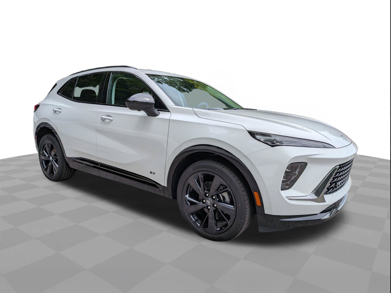 2026 Buick Envision Sport Touring in Summit White — front three-quarter view